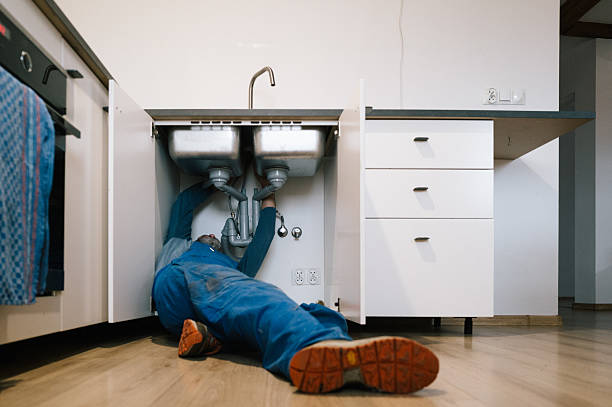 Professional Emergency Plumber technician working in Riverside, MD